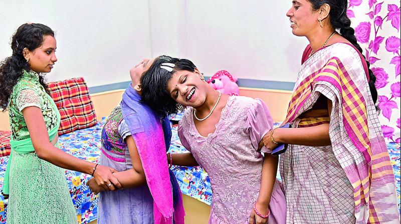 Conjoined twins Veena-Vani are welcomed at the at the government-run Shishu Vihar at Ameerpet.