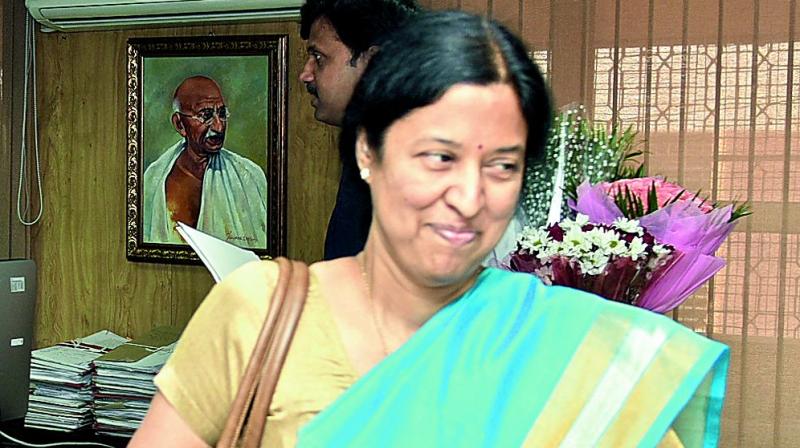IAS officer Y. Srilaxmi comes out of the chief secretary chambers after greeting the newly-appointed Chief Secretary S.P. Singh at Secretariat in Hyderabad on Sunday.