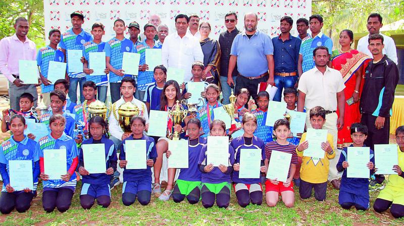 Sailors from Telangana pose with their certificates and trophies won at the India International Regatta, during a felicitation function in Hyderabad on Sunday.