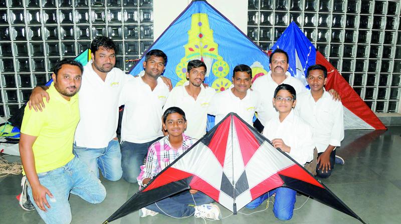 Members of the Kohinoor Kite Flying Club pose with their kites. The club is 15 years old and is the first registered kite club in Telangana and AP. (Photo: DC)