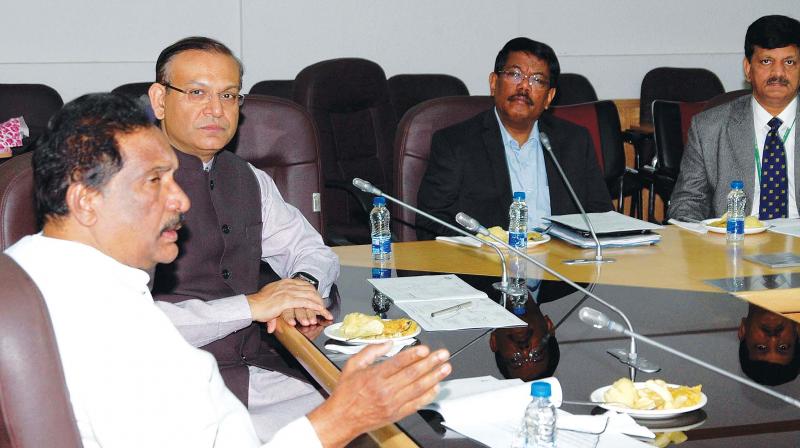 Bengaluru Development Minister K. J. George and Union Minister of state for Civil Aviation Jayant Sinha at a meeting on providing connectivity of metro rail facility to the Kempe Gowda International Airport at Vidhana Soudha Bengaluru on Friday. (Photo: KPN)