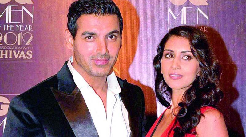 John Abraham has made sure his wife Priya Runchals life is kept away from the camera flashes.