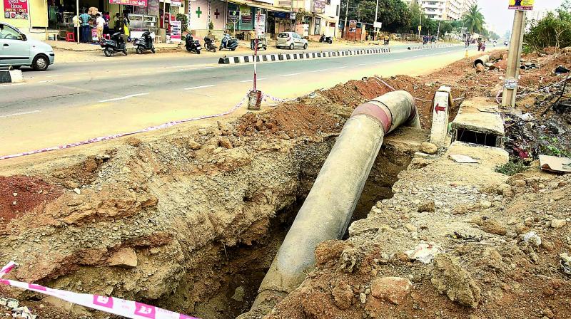 Work on laying water pipeline underway by the side of a road in Hafeezpet. (Photo: DC)