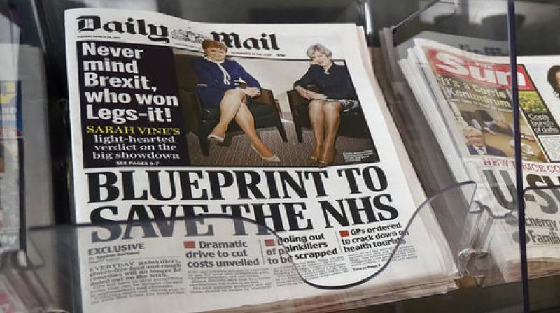 Britains Daily Mail newspaper has sparked complaints with a front page photograph focusing on the legs of Prime Minister Theresa May and Scottish First Minister Nicola Sturgeon.