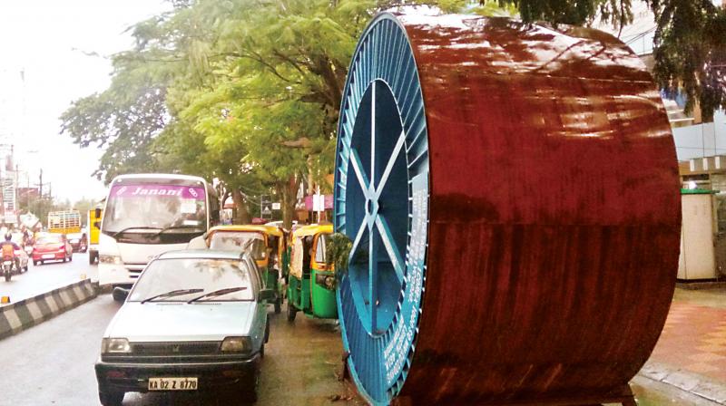 KPTCL cables being laid in Koramangala 80ft road on Monday   (Image: DC)