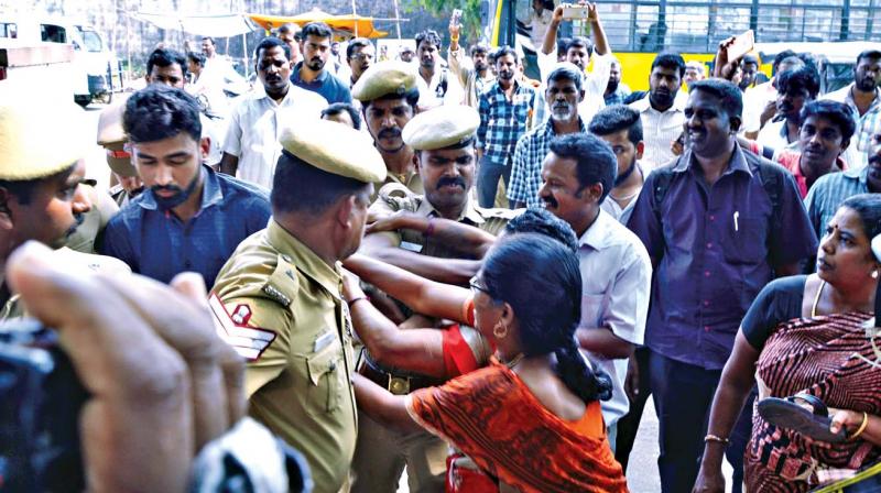 Police personnel ward off women who attempted to attack Dhashwanth on Chengelpet court premises on Wednesday (Photo: DC)