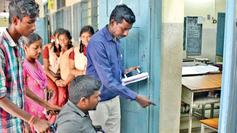Election official inspects arrangements for physically challenged at a polling booth on Tiruvottiyur high road, RK Nagar, on Wednesday. (Photo: DC)