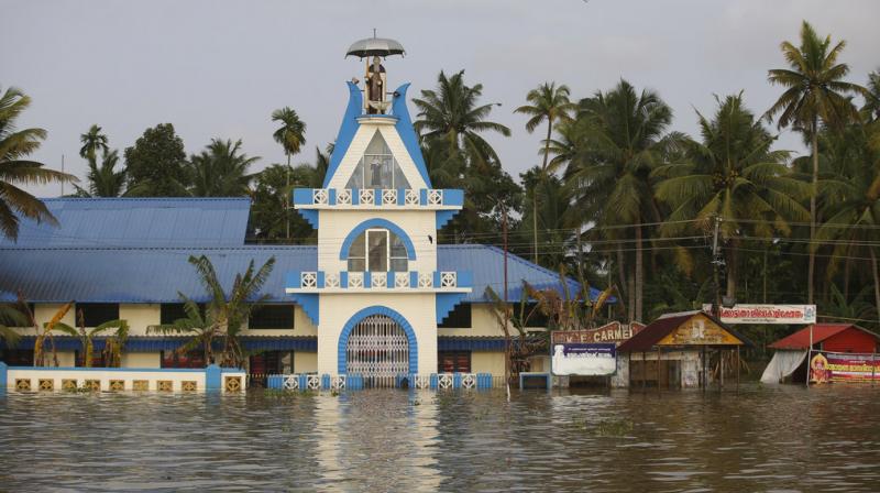 A church is seen partially covered in flood waters in Alappuzha in Kerala. The state has been battered by torrential downpours since Augusta 8, with floods and landslides. (Photo: AP)
