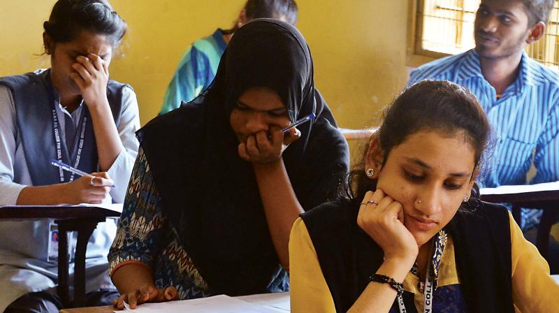 Second PU students appear in Bengaluru for final exams, which began on Thursday. (Photo: DC)