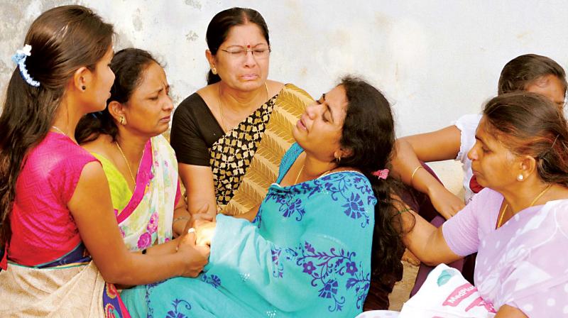 Family members and relatives of the three students at the district hospital in Tumakuru on Thursday. (Photo: KPN)