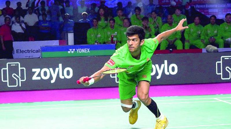 North Eastern Warriors Ajay Jayaram in action against Delhi Dashers Wing Ki Wong Vincent in Hyderabad.