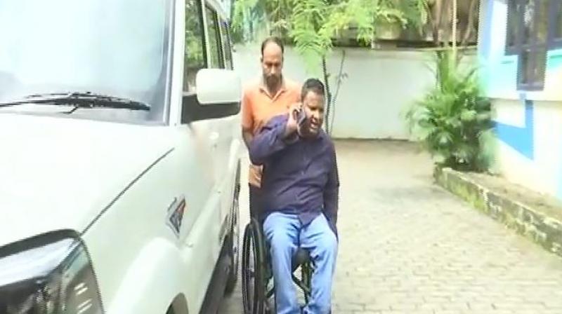 A wheelchair-bound director of an NGO for differently abled said he was abused for not standing while the National anthem was being played before the screening of a film at a multiplex. (Photo: Twitter | ANI)