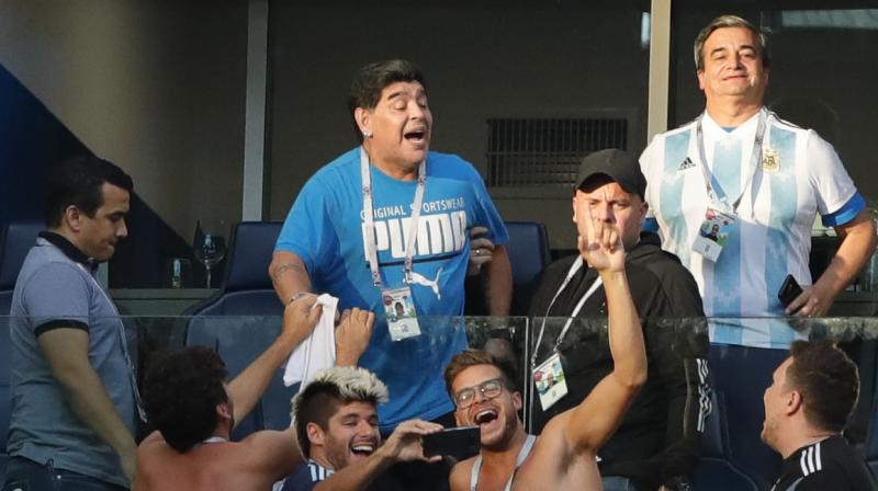 Diego Maradona roared and gesticulated through every anguished second of Argentinas rollercoaster World Cup victory over Nigeria on Tuesday before triggering alarm with a health scare after the final whistle. (Photo: AP)