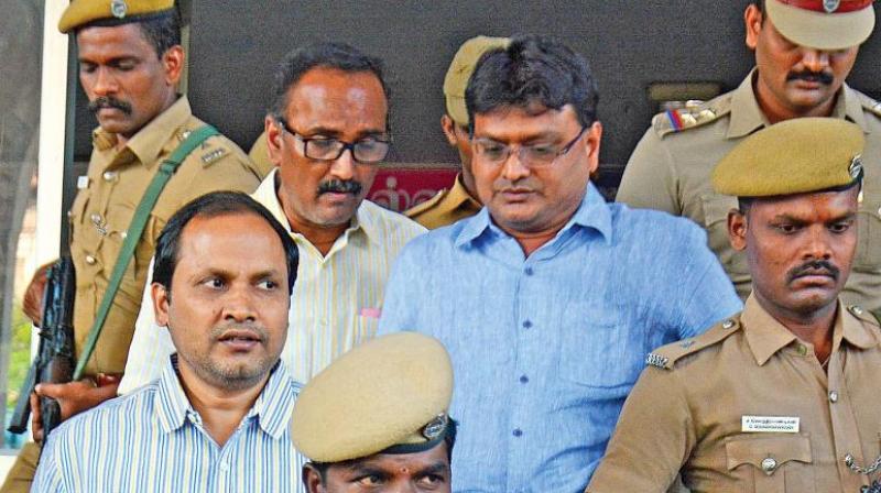 Arrested sand mining contractor J. Sekhar Reddy and his associates coming out of the XI Additional Special Court for CBI Cases. (Photo: DC/File)