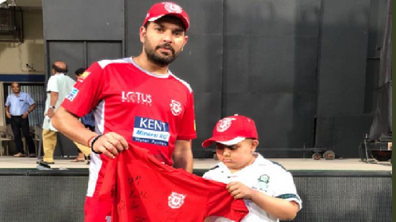 Yuvraj SInghs recent gesture  for a young fan that shows how good a human being he is. (Photo: Twwitter / Kings XI Punjab)