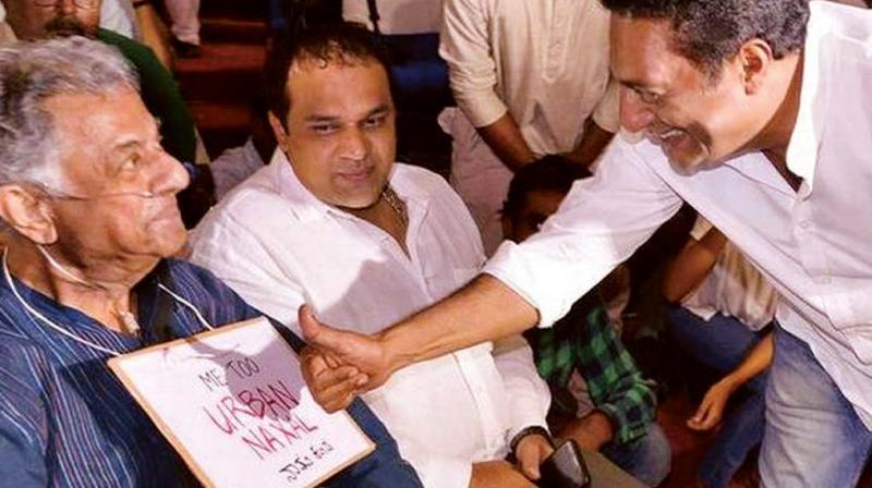 Jnanpith award winner Girish Karnad with actor-activist Prakash Raj at the Gauri Day rally to mark the first anniversary of her death. Karnad is seen sporting Me Too Urban Naxal placard