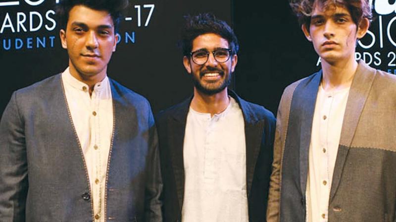 Ankit (middle) with models sporting his collection.