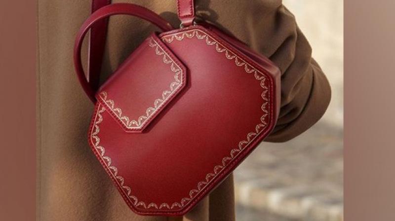 The handbag unveiled by Cartier, which is inspired by its iconic jewellery boxes is ideal for everyone with a unique touch of the post-Christmas blues. (Photo: ANI)