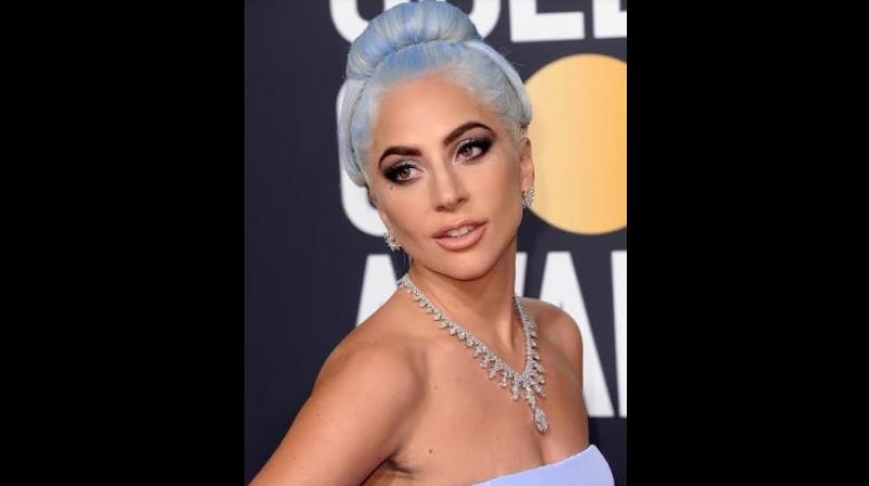 Lady Gaga wearing Platinum Jewelry.