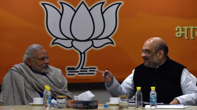 Prime Minister Narendra Modi and BJP President Amit Shah during the Central Election Committee (CEC) meeting for Uttar Pradesh state elections at BJP headquarters in New Delhi. (Photo: PTI)