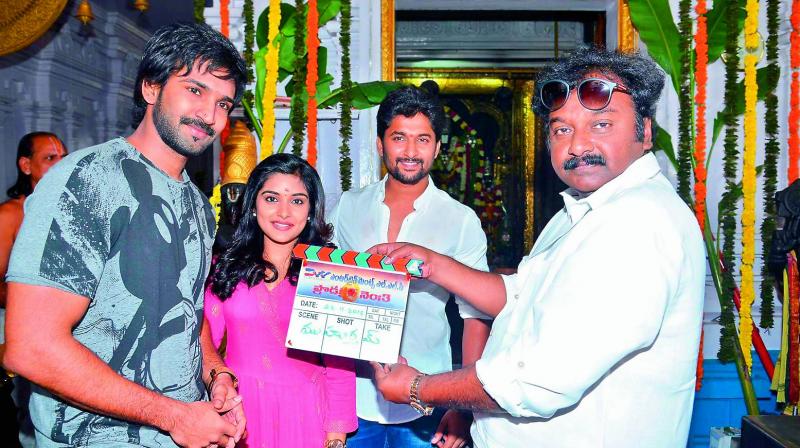 first shot: Director V.V. Vinayak gives the muhurat clap for the film. Spotted were actors Aadhi Pinisetty, Nivetha Thomas and Nani