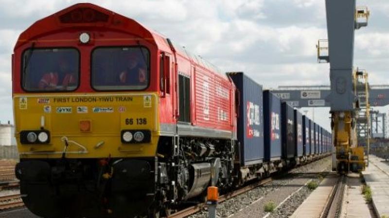 The rail route is cheaper than air freight and faster than sea freight, offering logistics companies a new middle option. (Photo: AFP)