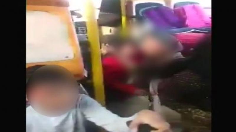A school bus attacked by protesters in Gurgaon against release of film Padmaavat. (Photo: ANI)