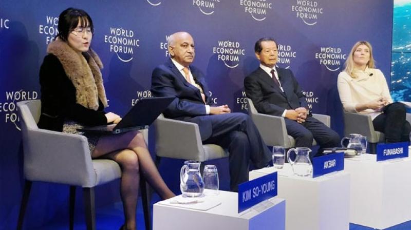 Minister of State for External Affairs M J Akbar along with other officials during a session on nuclear threats at the ongoing World Economic Forum in Davos on Wednesday. (Photo: PTI)