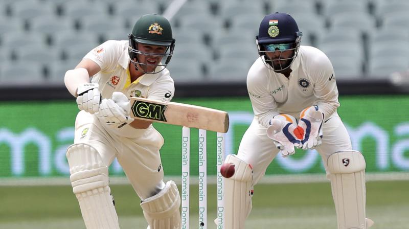 Travis Head remained unbeaten on 61 runs as Australia finished Day two at 191-7, trailing India by 59 runs.(Photo: AP)