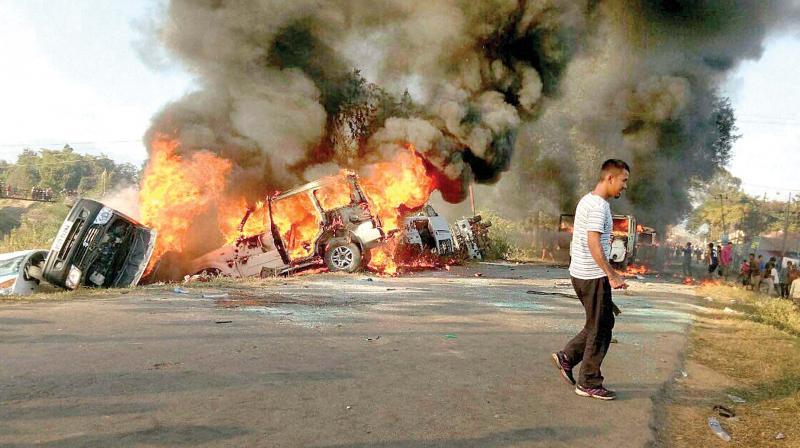 Angry protesters set vehicles on fire in Imphal East district on Sunday 	(Photo: PTI)