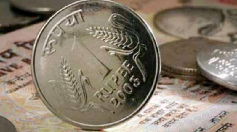 The domestic currency yesterday closed at 67.74 per dollar with gains of 8 paise on some dollar selling as the dollar weakned against the Japanese yen.