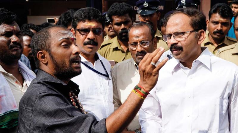 Kerala State Human Rights Commission member P. Mohana Das hears a devotee during the visit to Sabarimala on Tuesday. (By Arrangement)