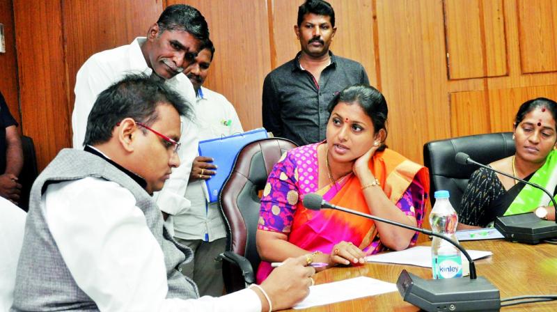 YSRC legislature R.K. Roja complains to Chittoor district collector P.S. Pradyumna about corrupt methods followed by TD leaders in various schemes in the district at Tirupati on Monday.