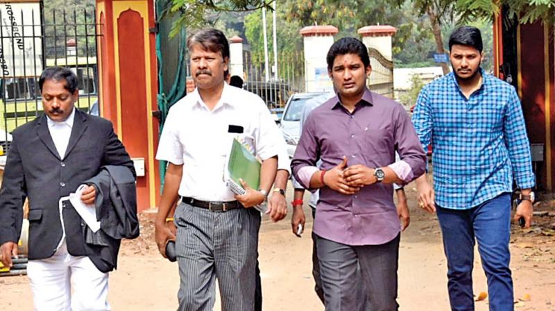Vivek Jayaraman and his associates appeared before Justice A. Arumughaswamy Commission on Tuesday. (Photo: DC)