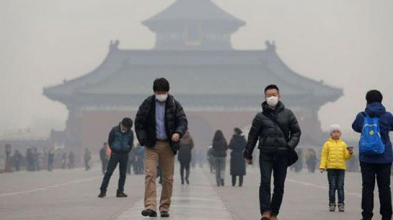 The huge quantities of emissions in the Beijing-Tianjin- Hebei region have directly led to the rise in average PM 2.5 density, a key indicator of air quality. (Photo: AFP)
