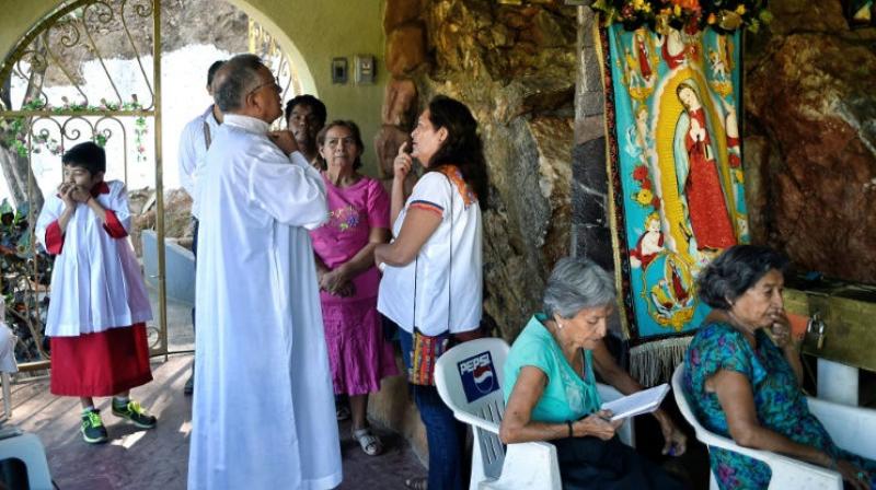 In all, 21 priests have been murdered in Mexico since President Enrique Pena Nieto took office in 2012, according to Church statistics. (Photo: AFP)