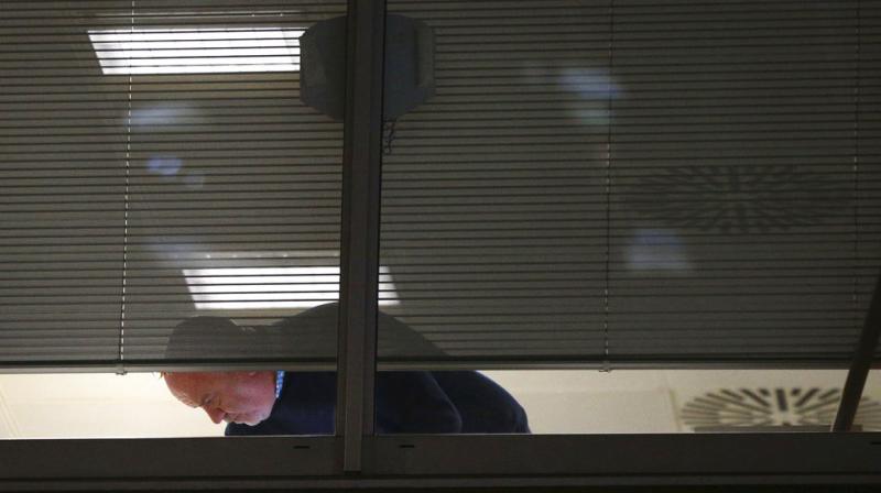 Information Commissioners Office enforcement officers work inside the offices of Cambridge Analytica in central London after a High Court judge granted a search warrant. (Photo: AP)