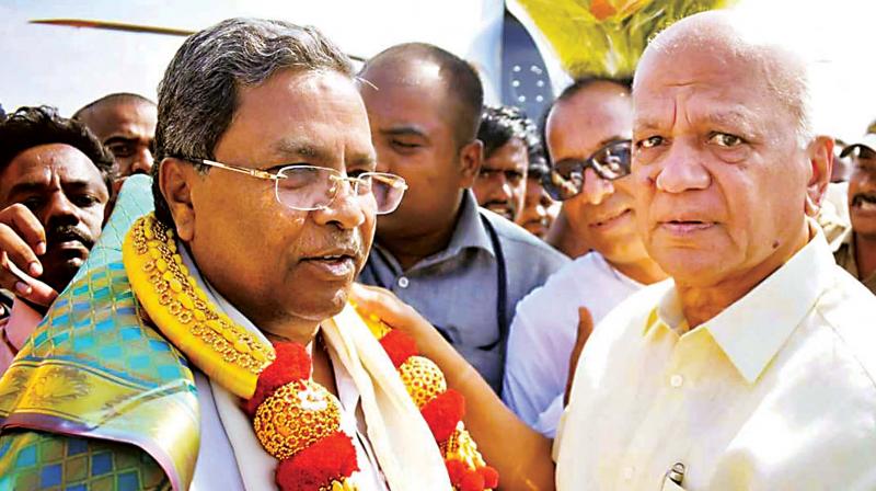 Former chief minister Siddaramaiah and former minister S.R. Patil at a felicitation function in Badami on Thursday 	 KPN