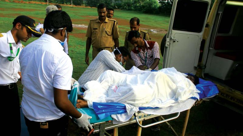 The girl who suffered burns ready to be airlifted in a helicopter from SH School ground at Chevittuveli in Kottayam on Thursday.  BY ARRANGEMENT