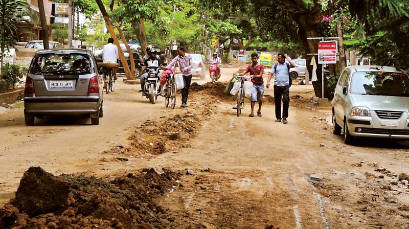 Dug up roads in 4th Block and 6th Block in Koramangala, Bengaluru, on Sunday. (Photo: R. Samuel)