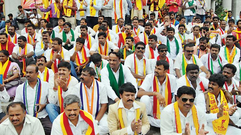 Members of the Federation of Kannada organisations protest in Bengaluru on Sunday in support of farmers and against Mondays Karnataka Bandh. (Photo: KPN)