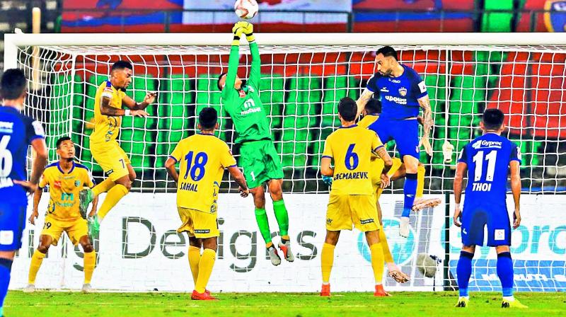 Action at the goalmouth during the ISL match between Chennaiyin FC and Kerala Blasters at the Nehru Stadium on Thursday.