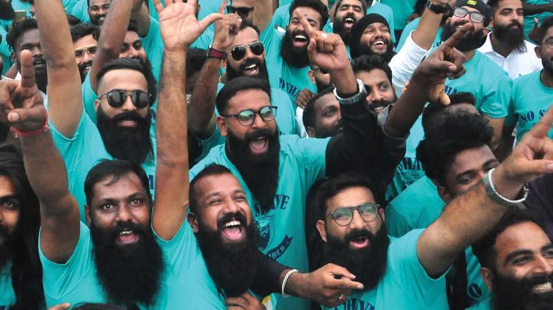 Members of Kerala Beard Society cheer during the No Shave November campaign at Kozhikode beach on Thursday. (Photo: Venugopal)