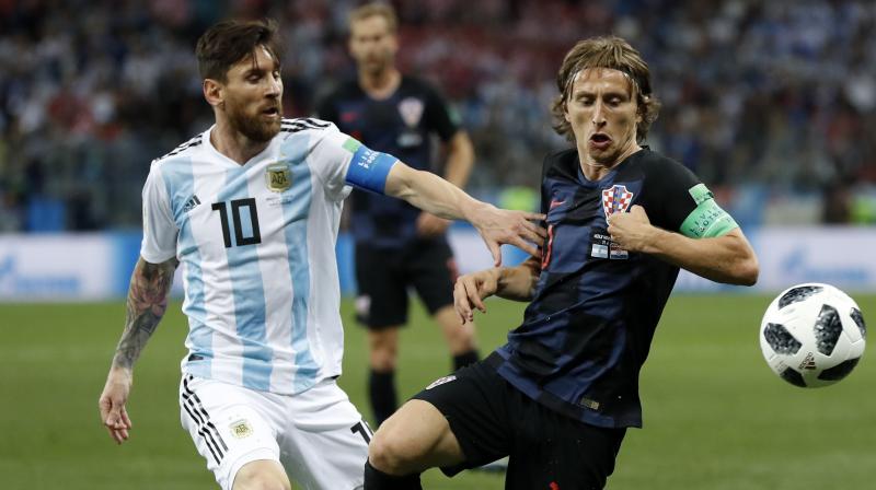 Rivals at club level, Argentina and Croatias captains faced off in Nizhny Novgorod, but it is Modric, not Messi, who was on the scoresheet to send his side into the last 16. (Photo: AP)