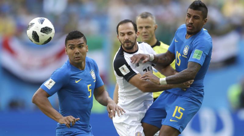 Neymar faced the most devoted of markers in Costa Ricas Cristian Gamboa, the Brazilian spending most of the half hopping over scything tackles or dodging past a barging shoulder. (Photo: AP)