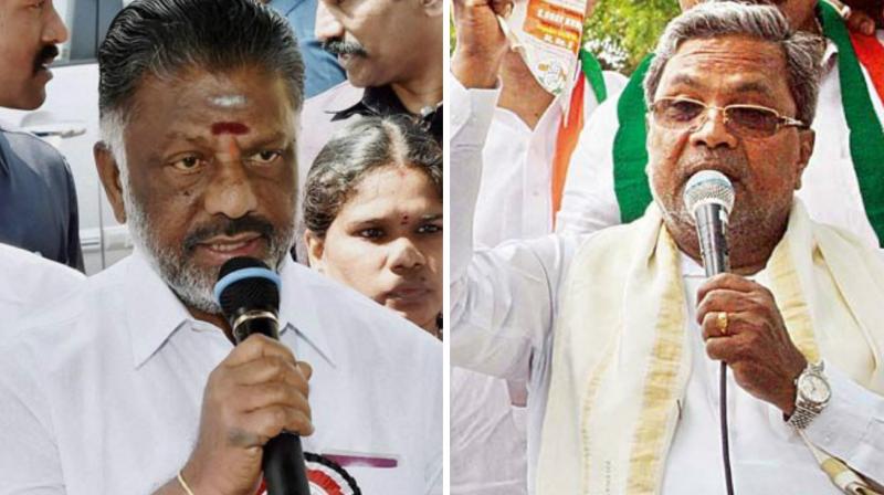 Tamil Nadu Chief Minister O Pannerselvam and his Karnataka counterpart.