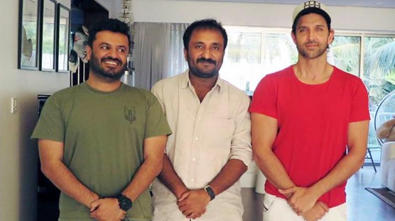 Vikas Bahl, Anand Kumar and Hrithik Roshan captured.