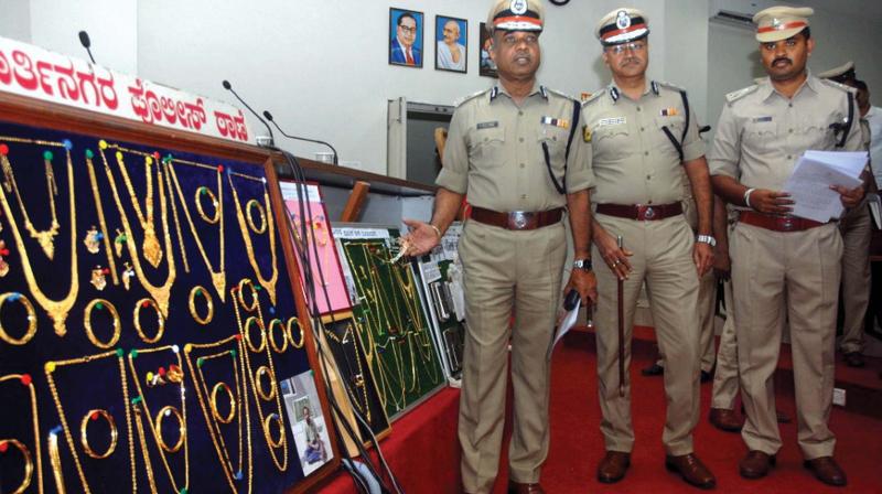 City Police Commissioner, T. Suneel Kumar inspects recovered items by the East division police displayed at a press conference in Bengaluru on Wednesday (Photo: KPN)