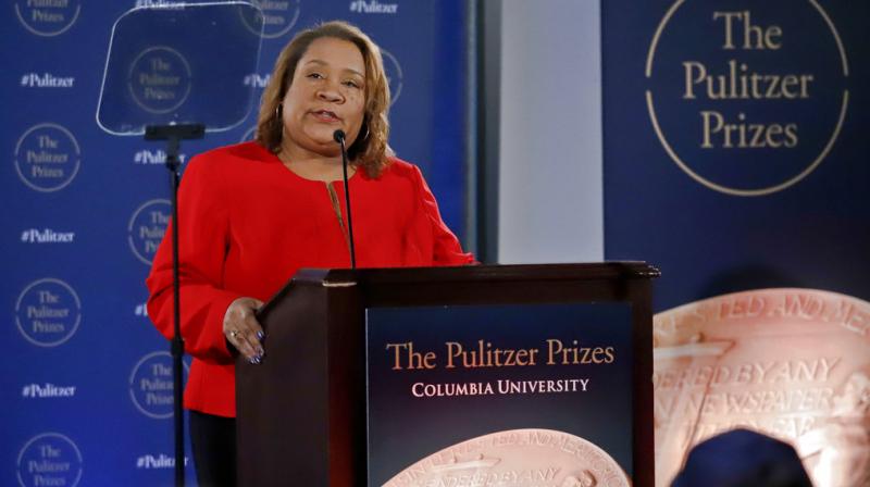 Dana Canedy, the new administrator of The Pulitzer Prizes, announces the 2018 winners, Monday April 16, 2018, at Columbia University in New York.