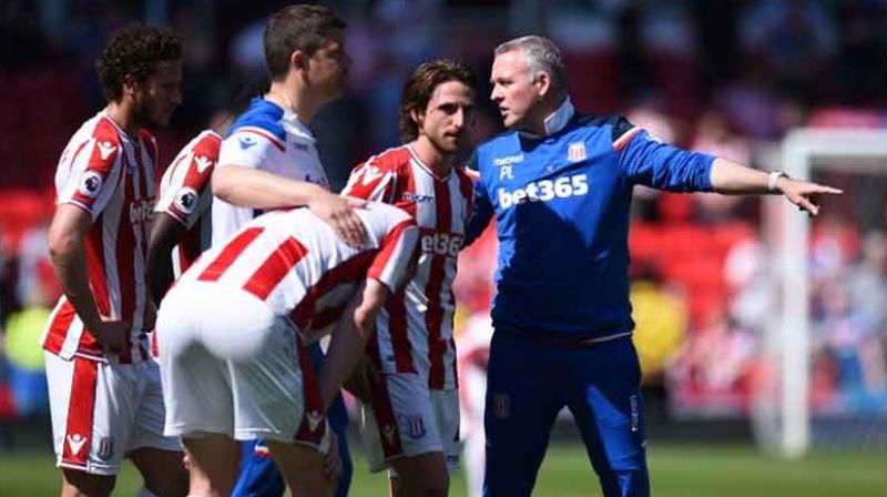 Stoke City were relegated from the English Premier League after a 10-year stay while West Bromwich Albion earned a stay of execution on Saturday. (Photo: AFP)